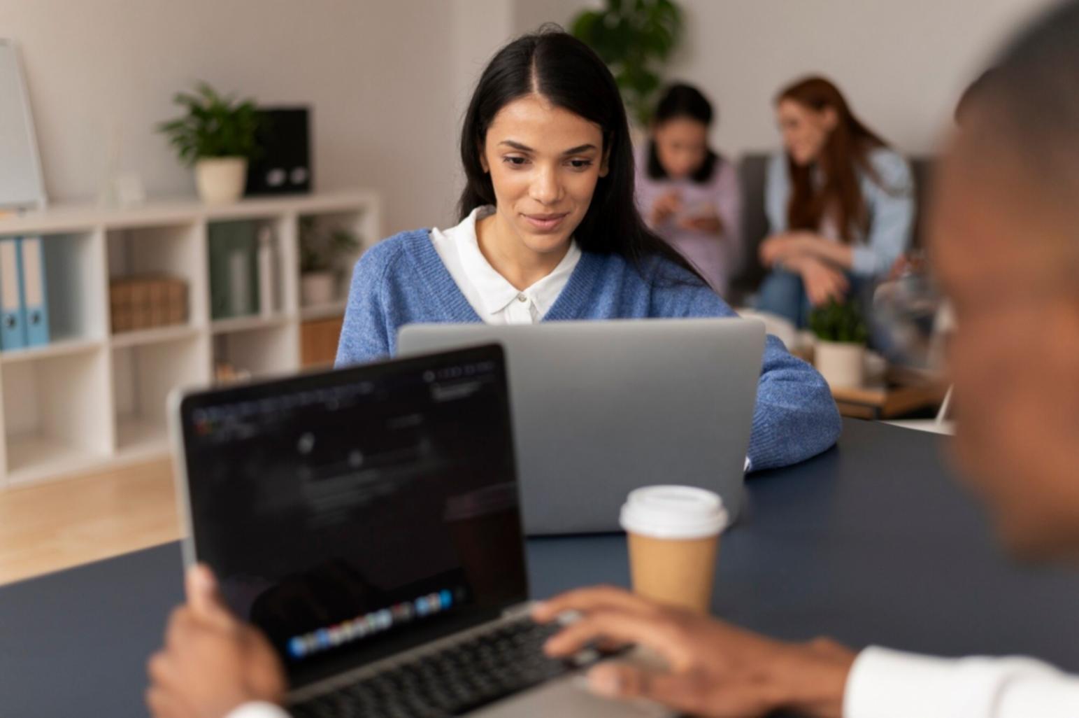 Student analyzing website performance metrics on laptop