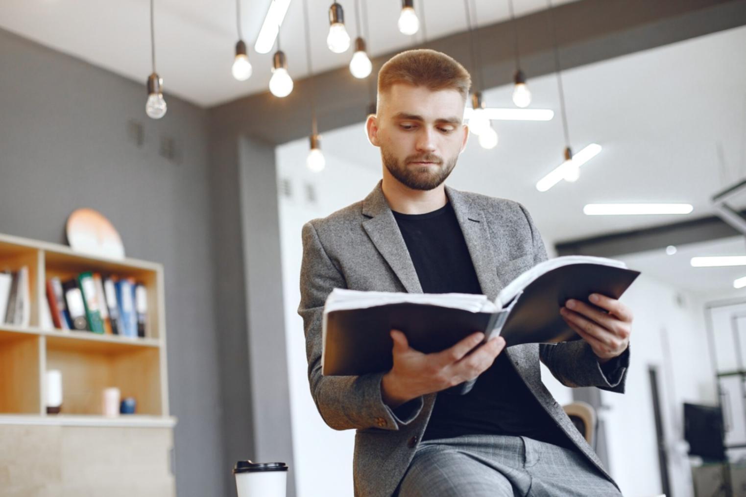 Collaborative workspace with team reviewing website analytics and optimization strategies